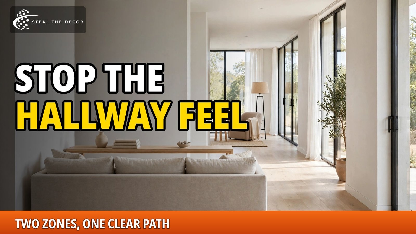 Long narrow living room arranged into two seating zones with a floated sofa